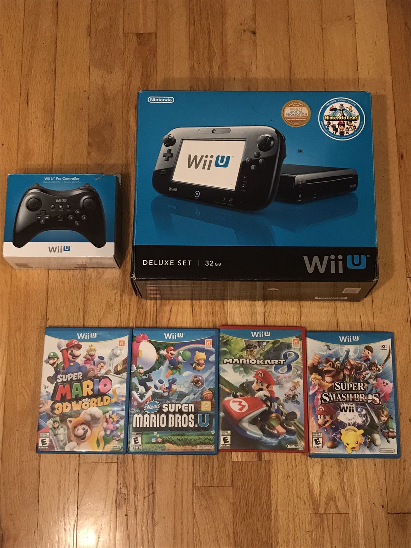 Wii U deluxe with 5 games and pro controller