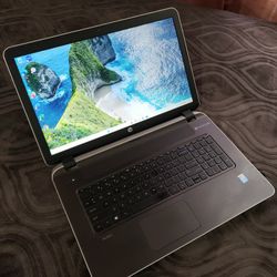 A BIG 17.3"inch Intel Core i3 Beatsaudio HP Laptop, 8GB RAM, 500GB HDD, Inbuilt Bluetooth, HDMI, DVD, SD Card Reader And a WebCam. Windows Installed.