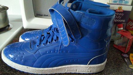 Brand new never worn puma leather hi tops size 10/1/2