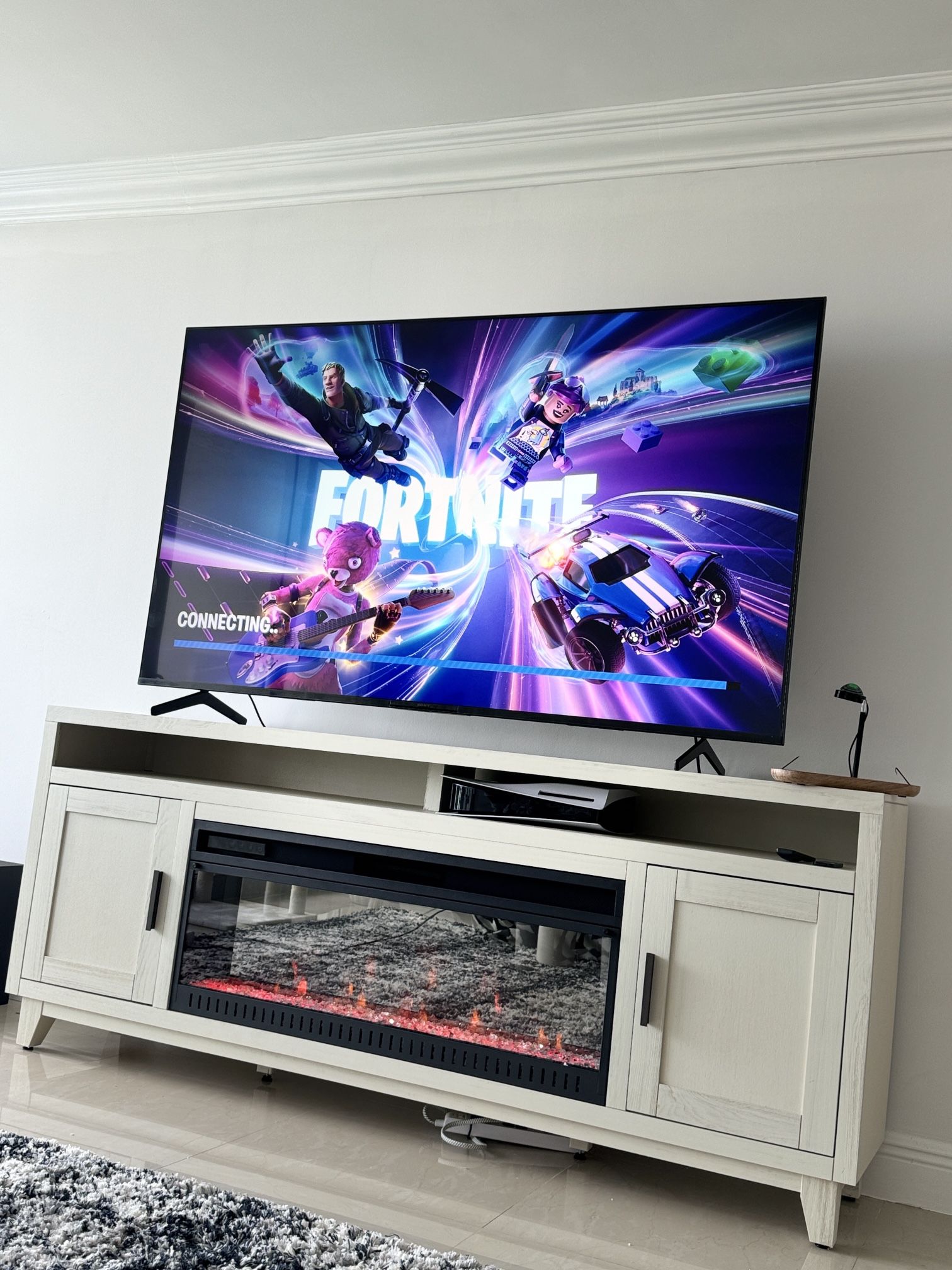 75 Inch Sony Bravia Smart Tv With Tv Stand With Fireplace!!!