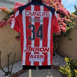 Chivas home Hormiga Gonzalez soccer jersey 2026