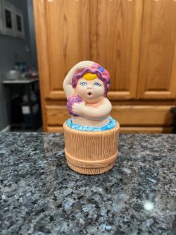 Vintage Ceramic Pair of Salt and Pepper Shakers. Brand new never used with stickers on the bottoms. Has been on display in a cabinet with a very lar
