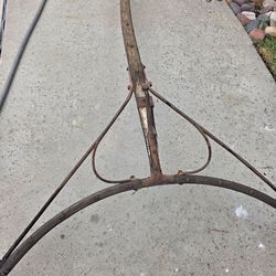 1900s 
This item is an antique wooden buggy tongue or pole, typically used for hitching two horses to a carriage or wagon.