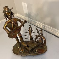 Incredibly Beautiful And Intricate Metal Artwork. Music Man.