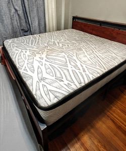 King Mattress with frame. Barely used.