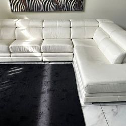 WHITE GENUINE LEATHER SECTIONAL SOFA W RETRACTABLE SEATS by QUEBEC 69 - LIKE NEW - delivery is negotiable