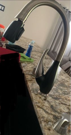 Faucet and soap dispenser