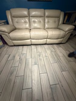 Cream Leather Reclining Sofa