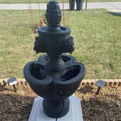 Outdoor Water Fountain New in Original Packaging With 2 Tiers and Ornate Lion Heads.