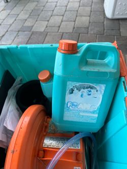 This is a Little Tikes FOAMO Foam Machine, which includes a blue plastic bin for storage and easy setup