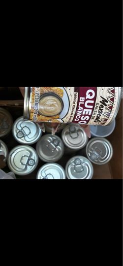 Cans of Queso cheese
