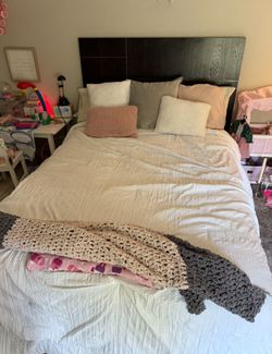 Dark Headboard With Decorative Lines And Full Sized Bed Frame