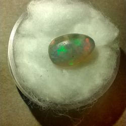 1.4 carat natural black opal