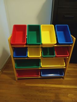 Toy organizer rack with storage bins