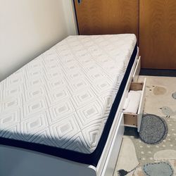 White twin platform bed with storage + Sealy memory foam mattress.