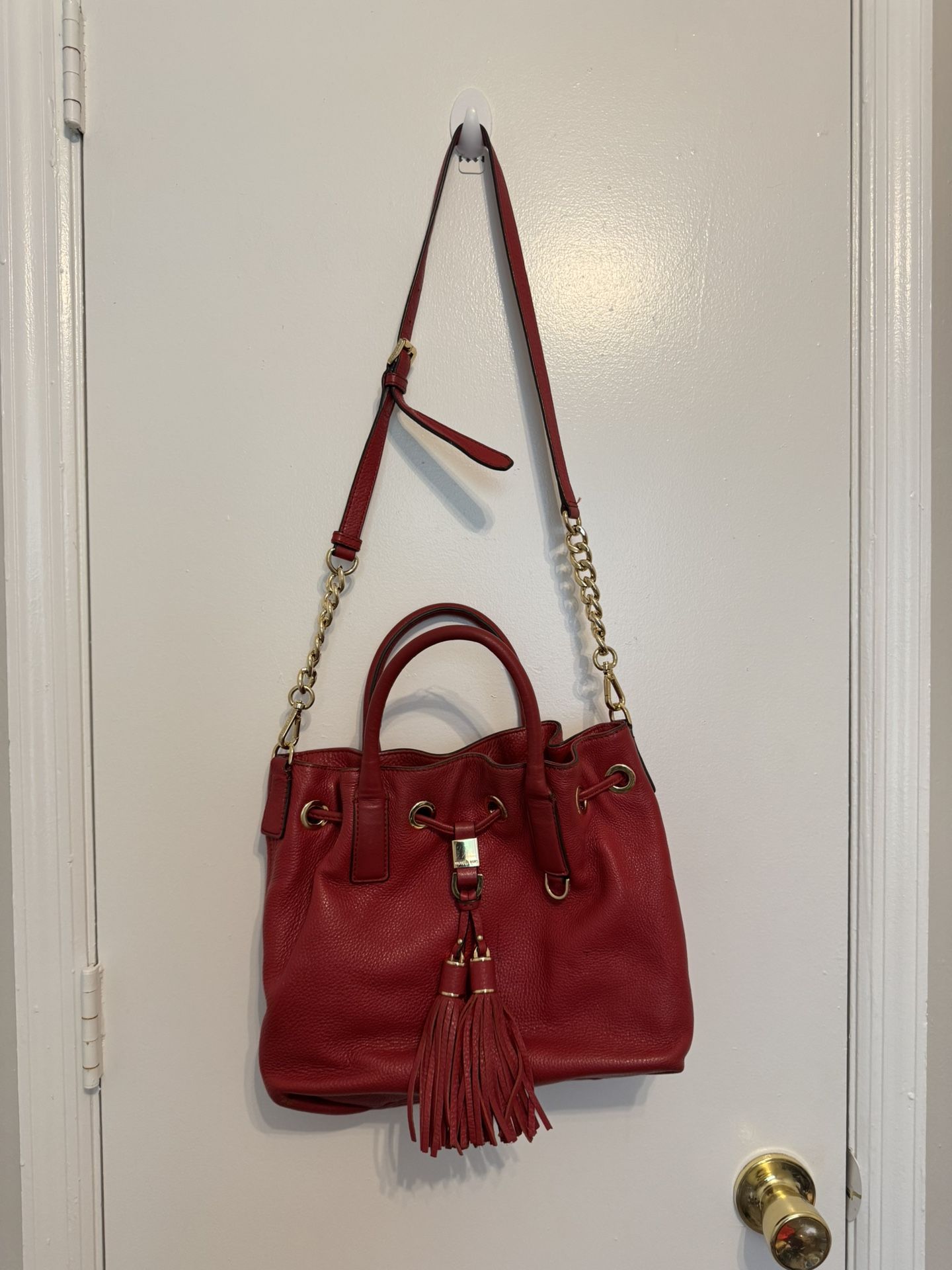 Michael Kors red tassel handbag and crossbody strap