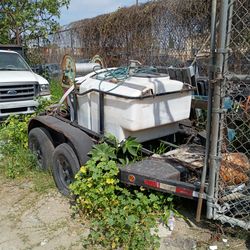 Water tank with trailer