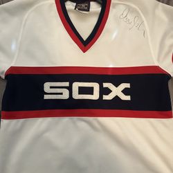 Signed Ozzie Guillen Jersey. 