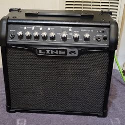 LINE 6 SPIDER IV 15 MODELING GUITAR COMBO AMPLIFIER 4 CHANNEL 15 WATTS 1X8 SPEAKER IN BLACK COLOR. 