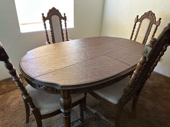 Wood table with four chairs and extension leaf solid wood $80