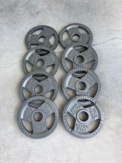 Olympic Barbell Grip Weight Plates 2” hole  $100 new