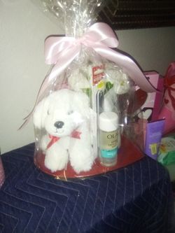 White Puppy, Tulips, Olay toner , La RochePosay Wash.. On A Red Ceramic Heart Tray,❣️
