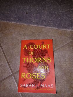 A Court of Thorns and Roses by Sarah J. Maas
Good condition paperback copy of A Court of Thorns and Roses. This fantasy novel is written by Sarah J. M