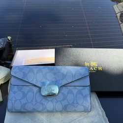 light blue coach purse