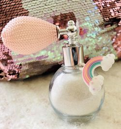 Just Shine Rainbow Hair & Body Shimmer. Loose dry shimmer. New in box retails $10. Super cute vintage style bottle. Add a little sparkle to their live