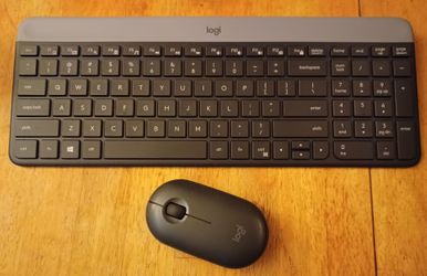 Logitech Slim-Line Wireless Keyboard And Mouse Combo With USB Receiver Included In Like New Condition Working Perfectly