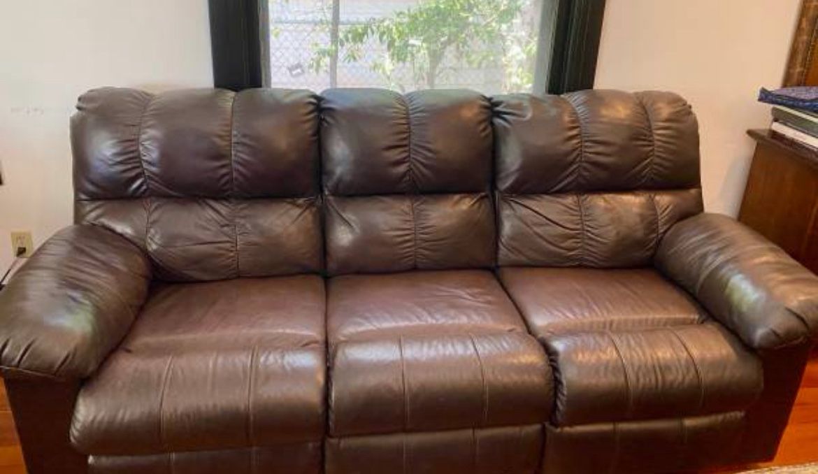 Reclining Brown, leather couch and loveseat good