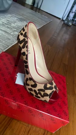 Guess high heals new in box