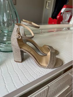 Jessica Simpson pumps, champagne color, size 7, 3-inch heel. In very good condition—worn only once.