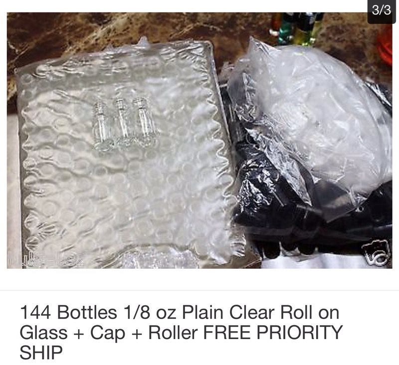 1/8 clear glass roll on with black cap