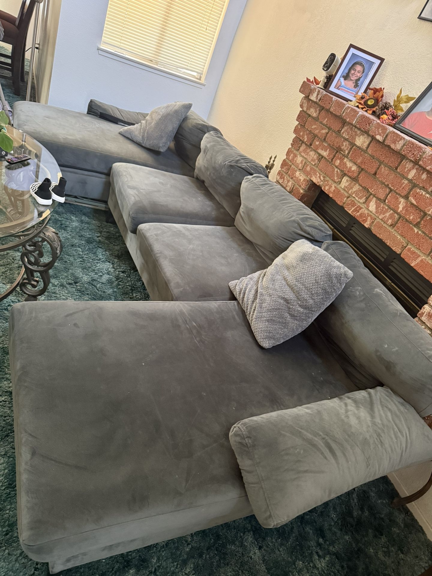Small Dark Grey Couch .