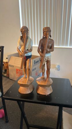This item is a vintage mid-century hand-carved Filipino Igorot tribal hunter sculpture, which typically holds a market value between $150 and $375 USD