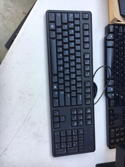 Computer screens , keyboard , mouse .