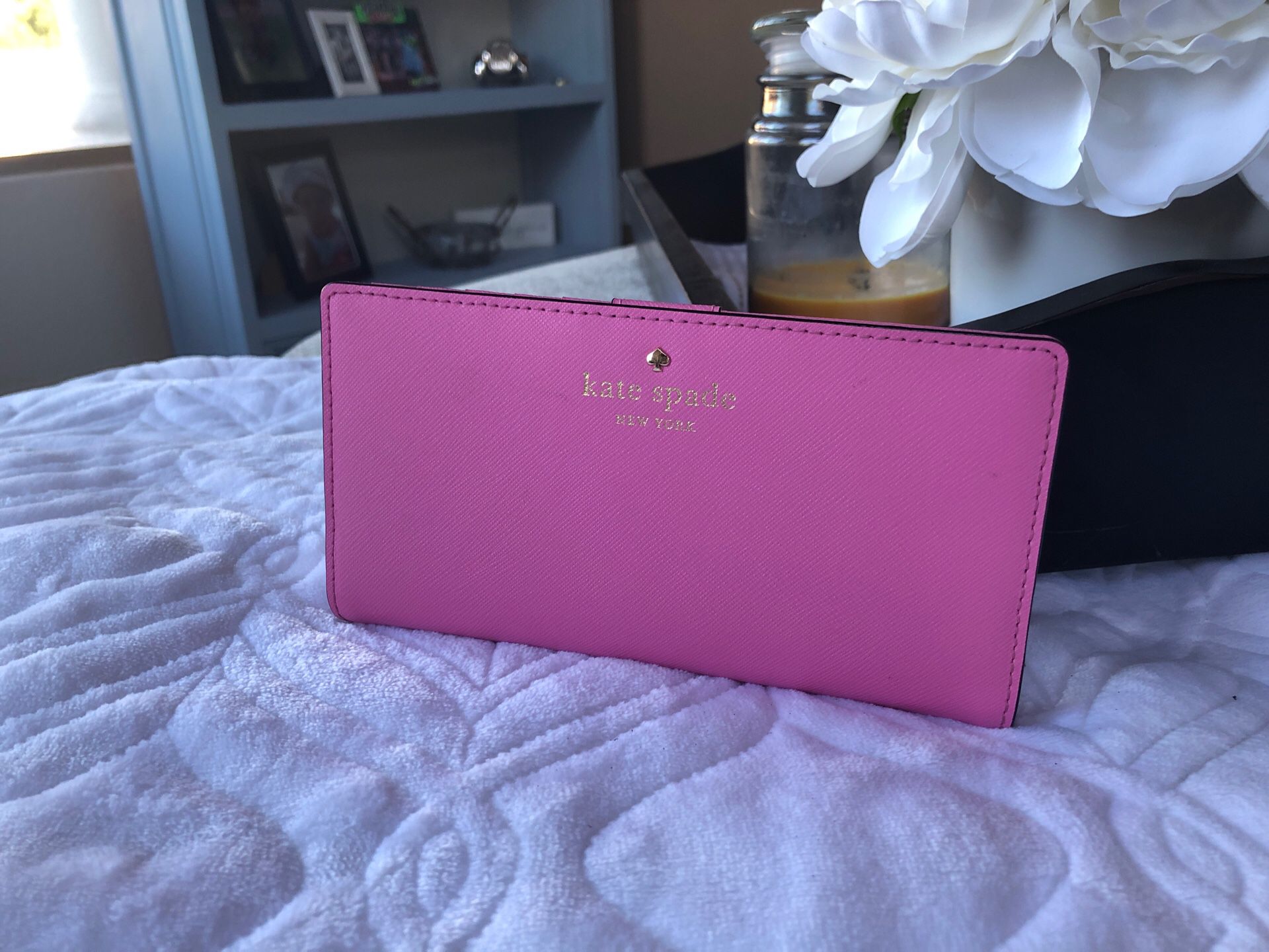 Cute Kate Spade pink leather wallet .