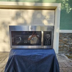 Like New Stainless GE Above Range Microwave 