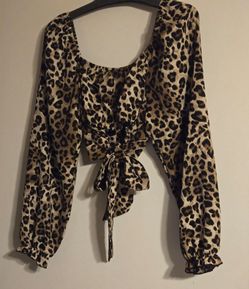 A animal print long sleeve blouse with tie