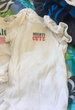 Variety of onesies from sizes NB to 6 months