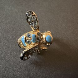 Vintage bumblebee Joan Rivers brooch,gold-tone,enamel, blue crystal rhinestones.