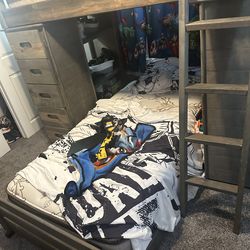 Bunk bed with mattress like new & drawer also desk