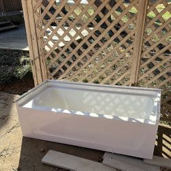Bathtub and granite piece