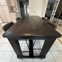 dining table (bar height) + 4 chairs