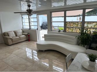 White Curved Kidney-Shaped Channel Tufted Sofa