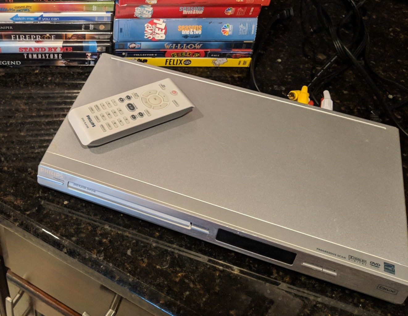 Phillips DVD player w/remote and DVDs. *Pickup in Oldsmar or meet in Clearwater* No trades. Cash Only.