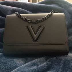 Louis Vuitton Epi Leather/black Lock Twist Shoulder Bag