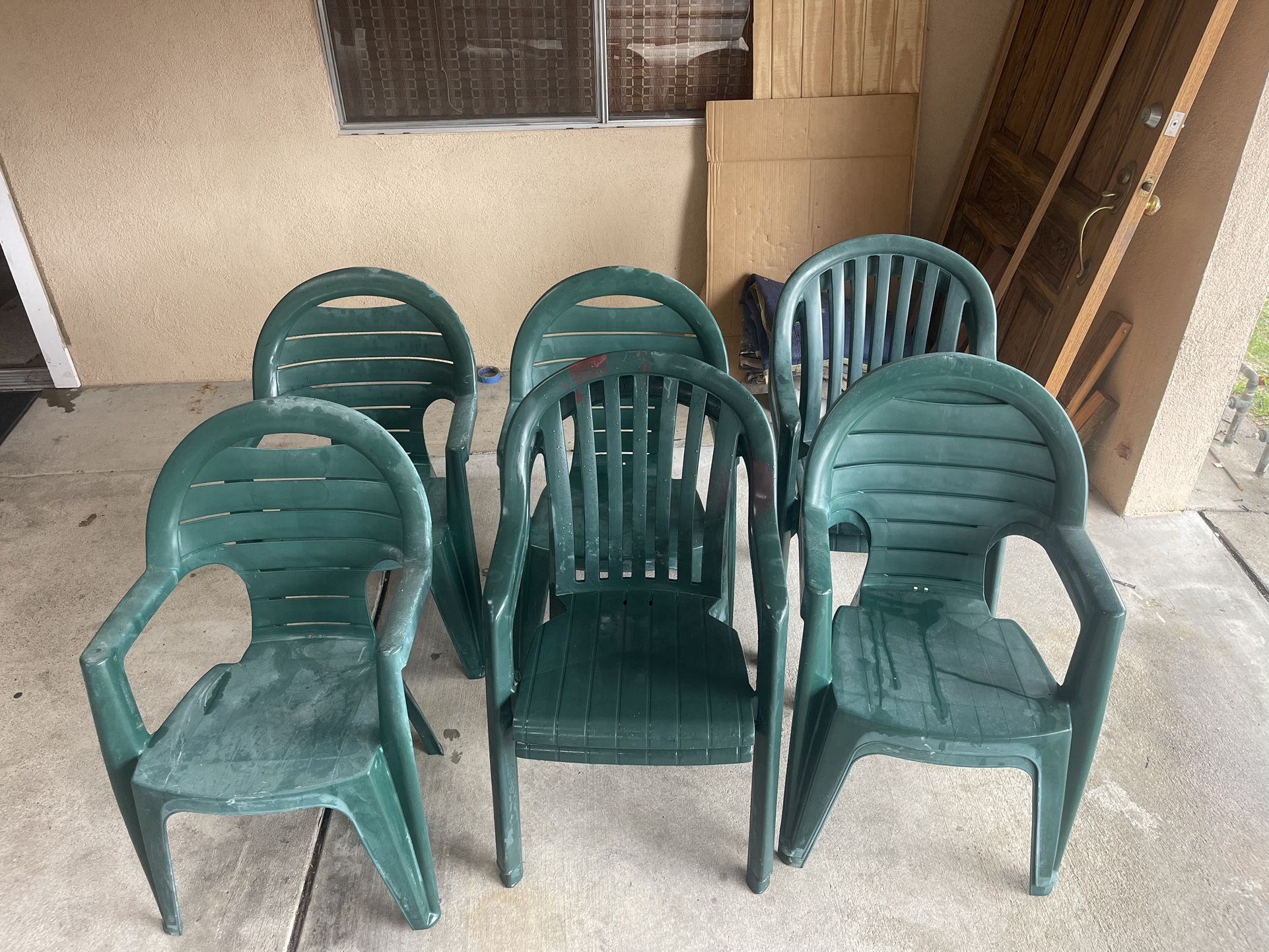 9 Green Plastic Stackable Lawn Chairs