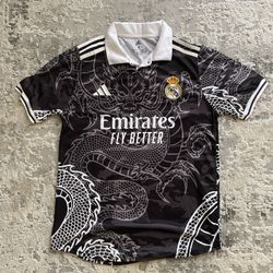 Real Madrid special edition black dragon jersey by Adidas.